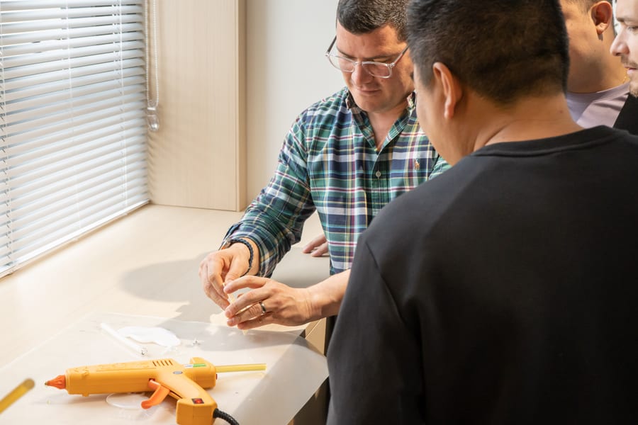 Clients observing bonding test demonstration