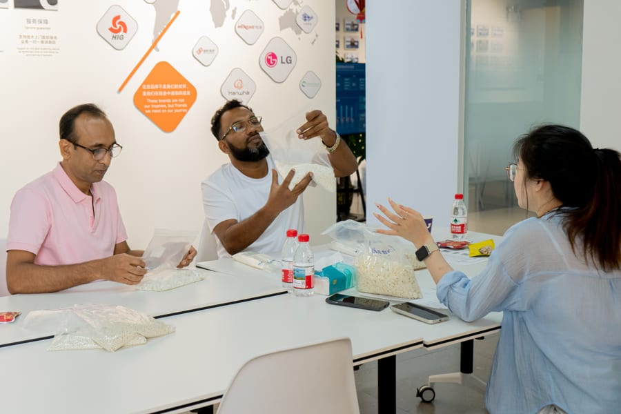 Clients examining hot melt adhesive samples