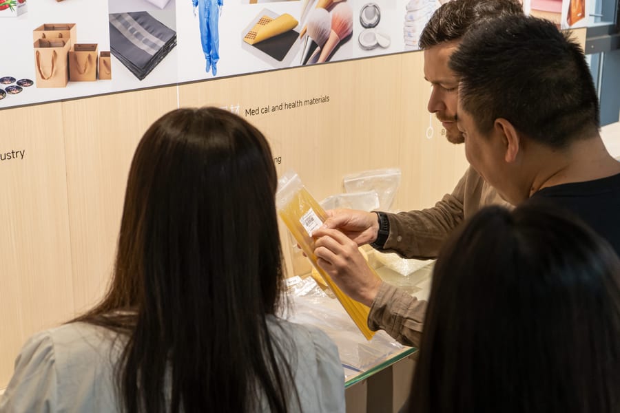 Clients inspecting adhesive film products