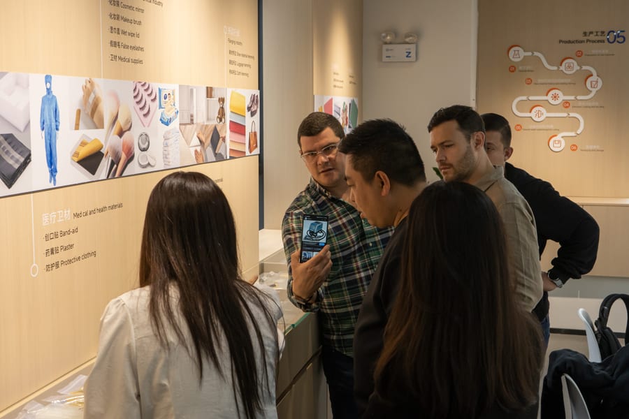 Clients touring the product showroom