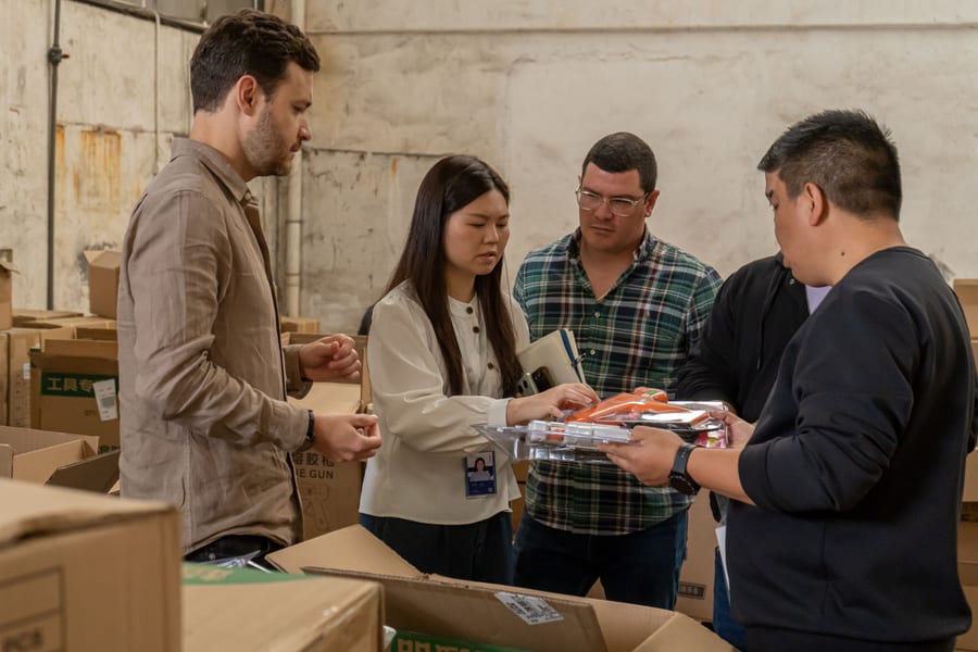 Clients inspecting finished goods in warehouse